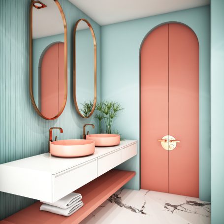 Moderne Badezimmeransicht mit zwei Waschbecken, rosa Türen und stilvollen Spiegeln.